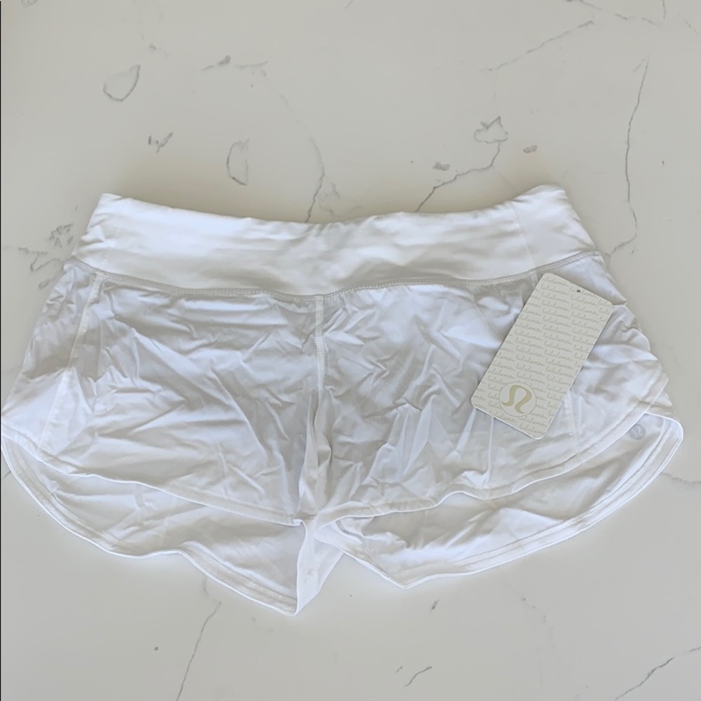 Brand new speed up short, lululemon size 8 white